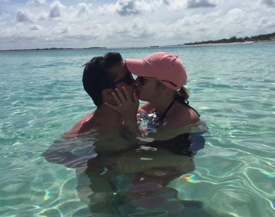 Daughter who brings wedding to sick father kisses fiancee in ocean