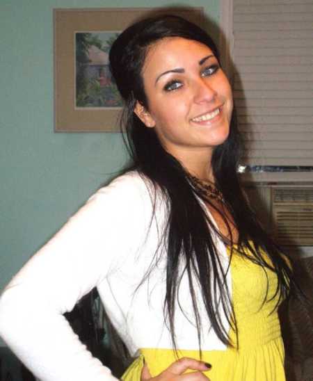 Young woman who was in an abusive relationship and will overdose smiling with hand on hip