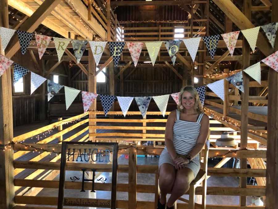 Woman sits in barn her father restored for her to get married in 