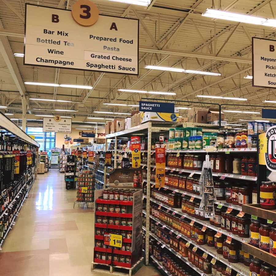 Grocery store aisle representing woman's uncomfort when she goes and has to dodge people's questions