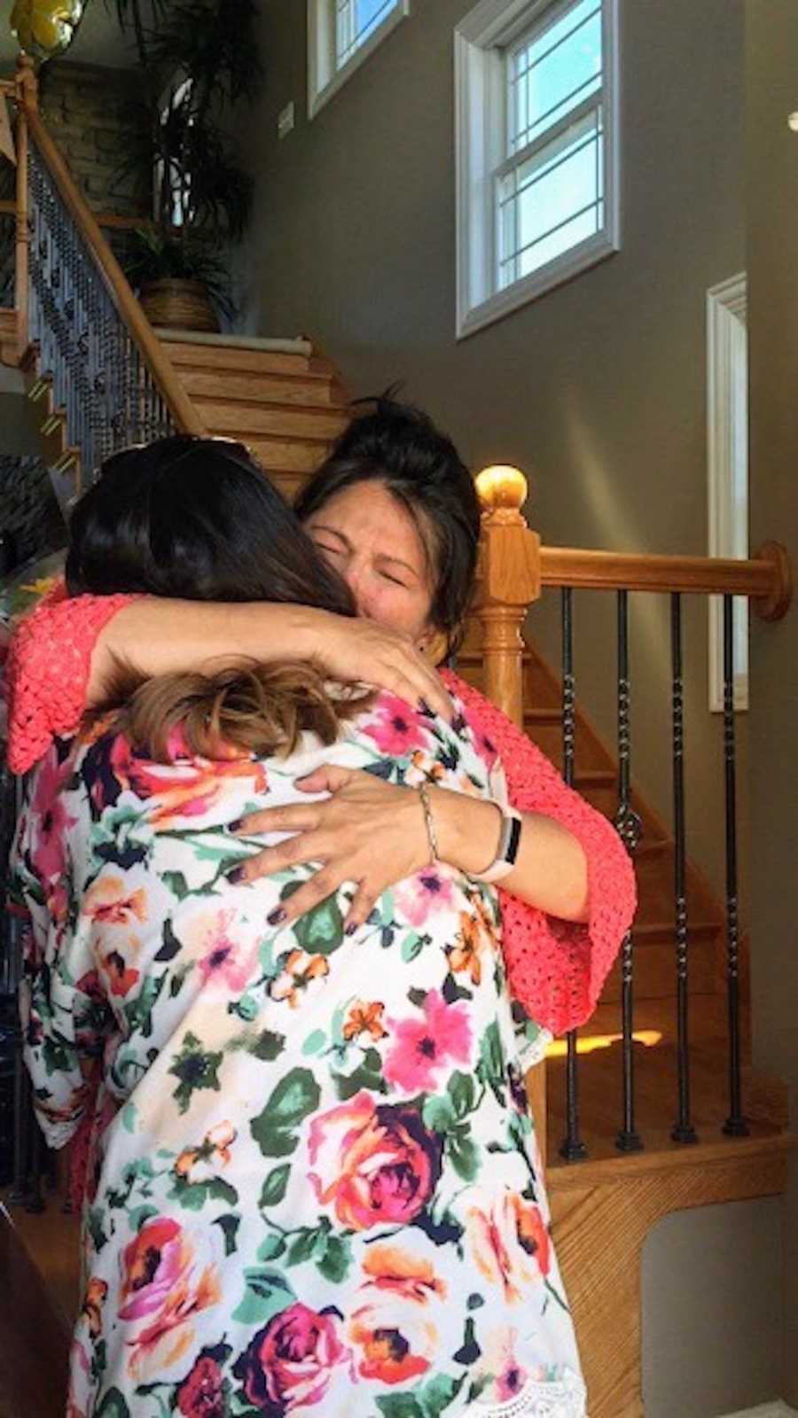 Mother who gave up her child for adoption when she was a teen hugs her for first time