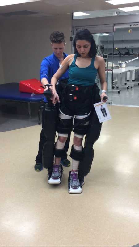 Woman with Chiari Malformation in rehab learning to walk again