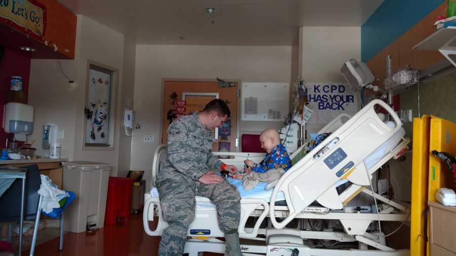 Little boy who was supposed to start kindergarten sits in hospital bed with brain cancer with his dad