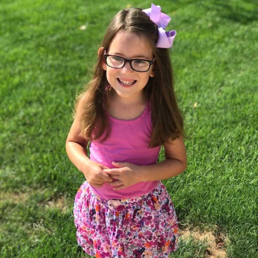 Little girl whose mother lost two babies smiles for her first day of school