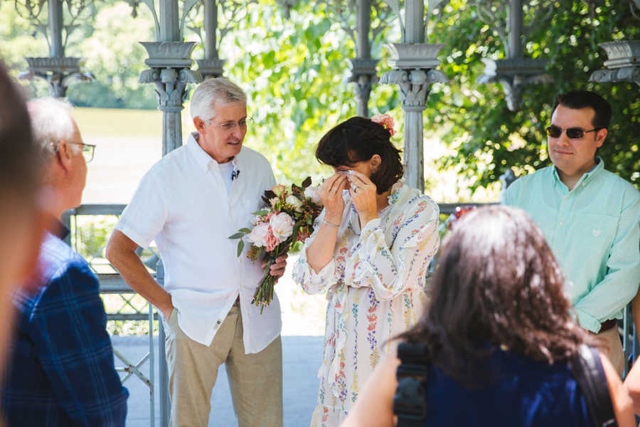 Wife who lost memory after car accident wipes away tears beside husband at vow renewal