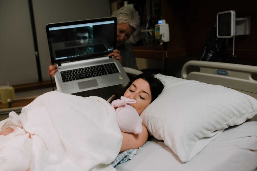 Woman Skypes with her Marine husband to show him their newborn daughter