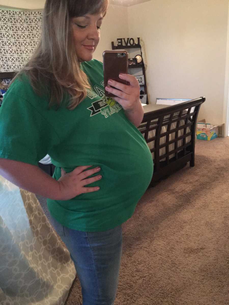 Pregnant woman who was scared she couldn't give husband family he wanted takes mirror selfie in bedroom