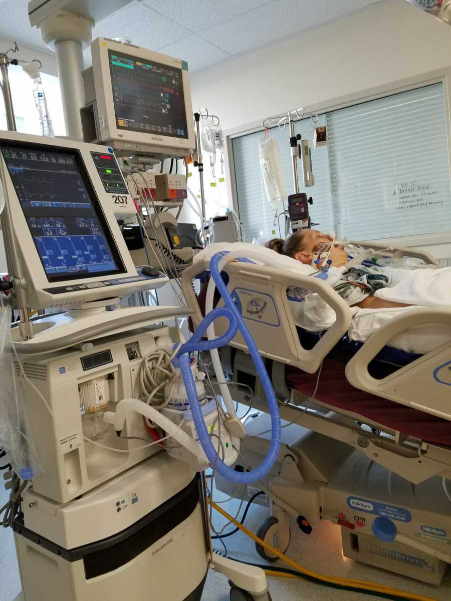 Woman who died at childbirth but brought back to life lies in hospital bed with ventilator