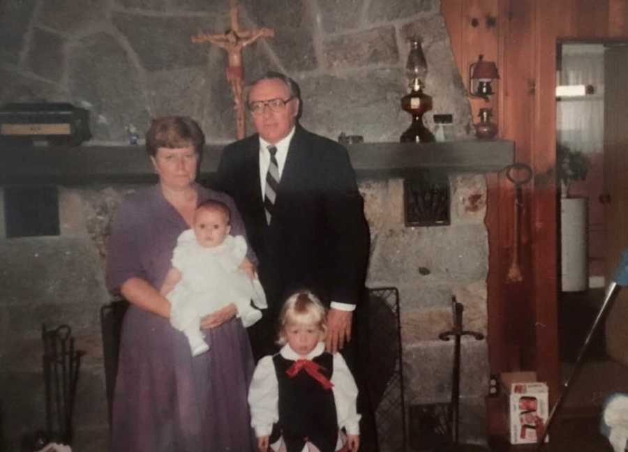 Woman who struggled with addiction as a little girl standing with her mom, dad, and little sister