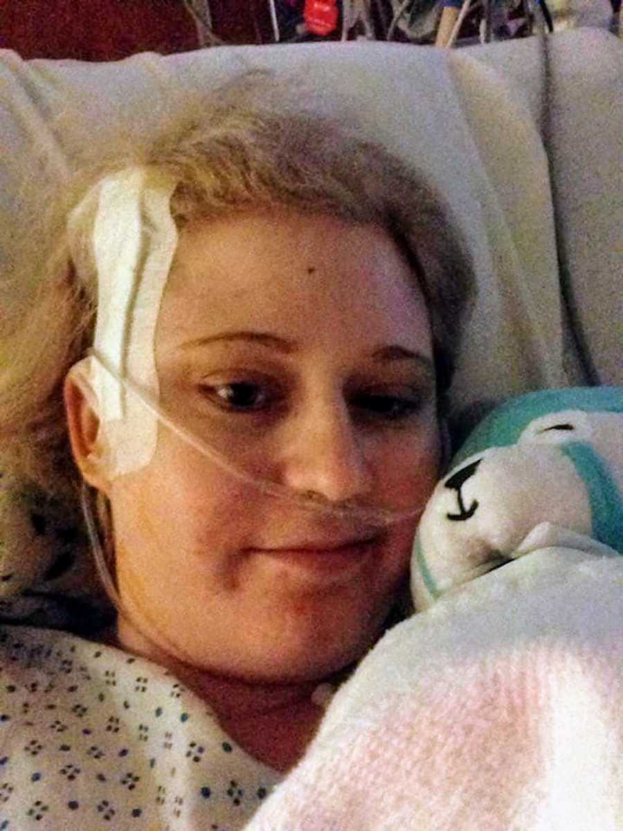 Epileptic wife laying in hospital bed with bandage on her head after having seizures that made her unconscious