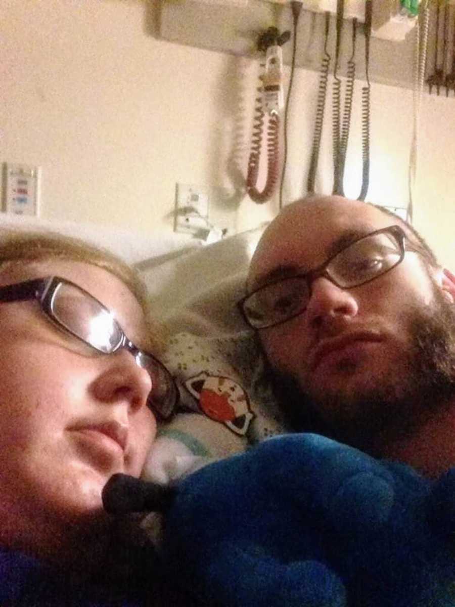 Husband who became septic lies in hospital bed with sleeping wife