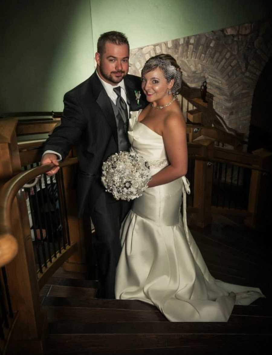 Woman who is afraid she can't give her husband the family he wants, standing with husband on wedding day