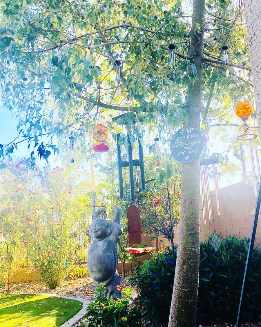 Wind chimes in tree that nurse put up for every angel baby she's delivered