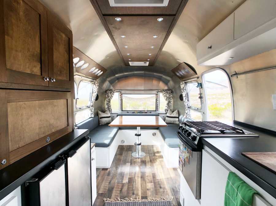 Refurbished kitchen in airstream that is now home to family of six