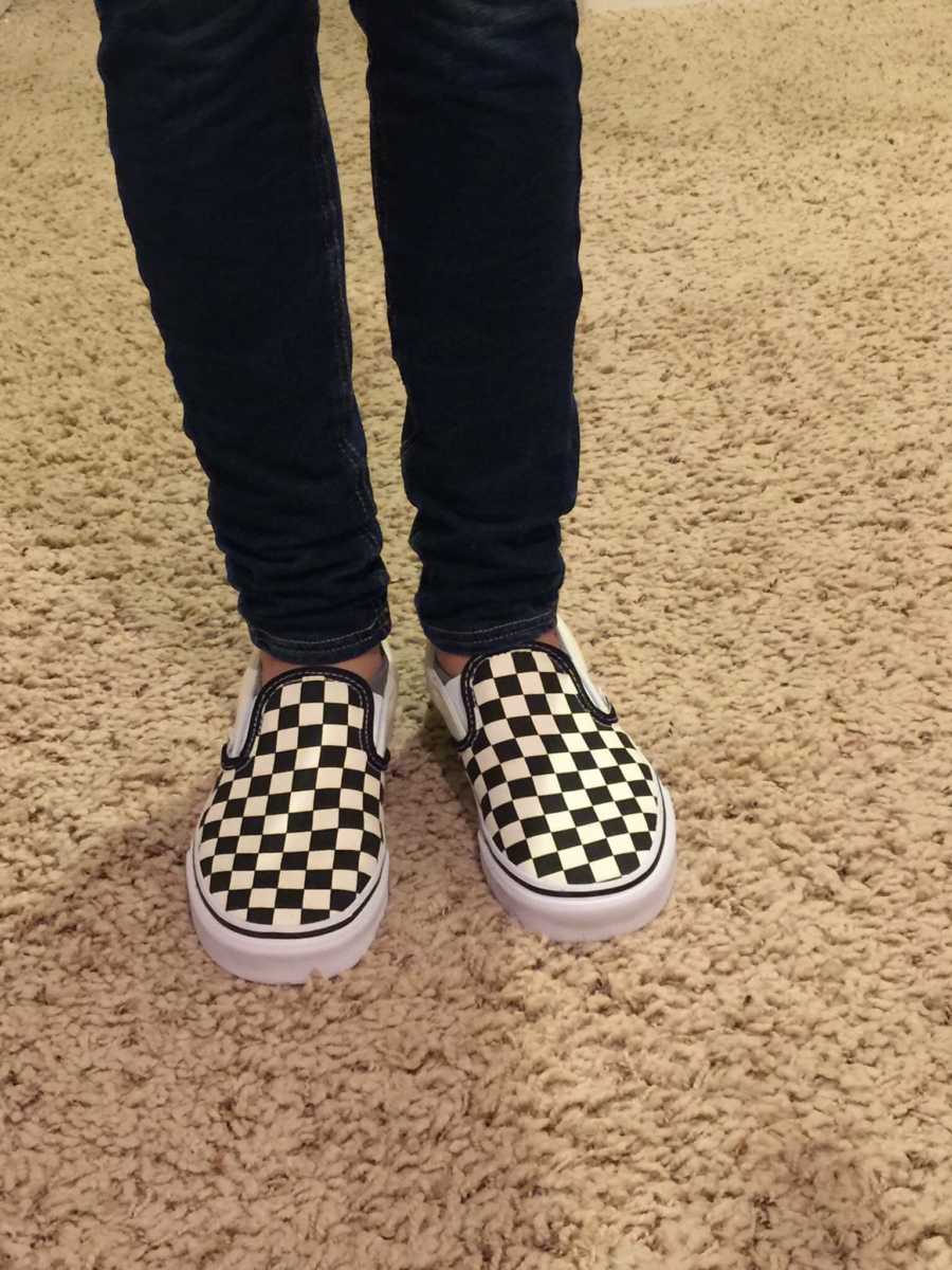 Close up of daughter's feet wearing vans whose mother told her she had them when she was younger