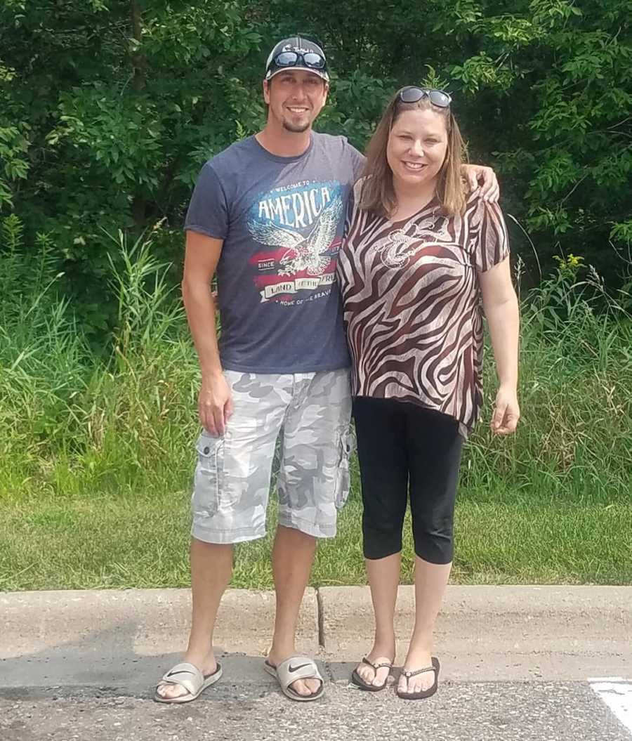 Brother and sister who was put up for adoption smile at their first meeting