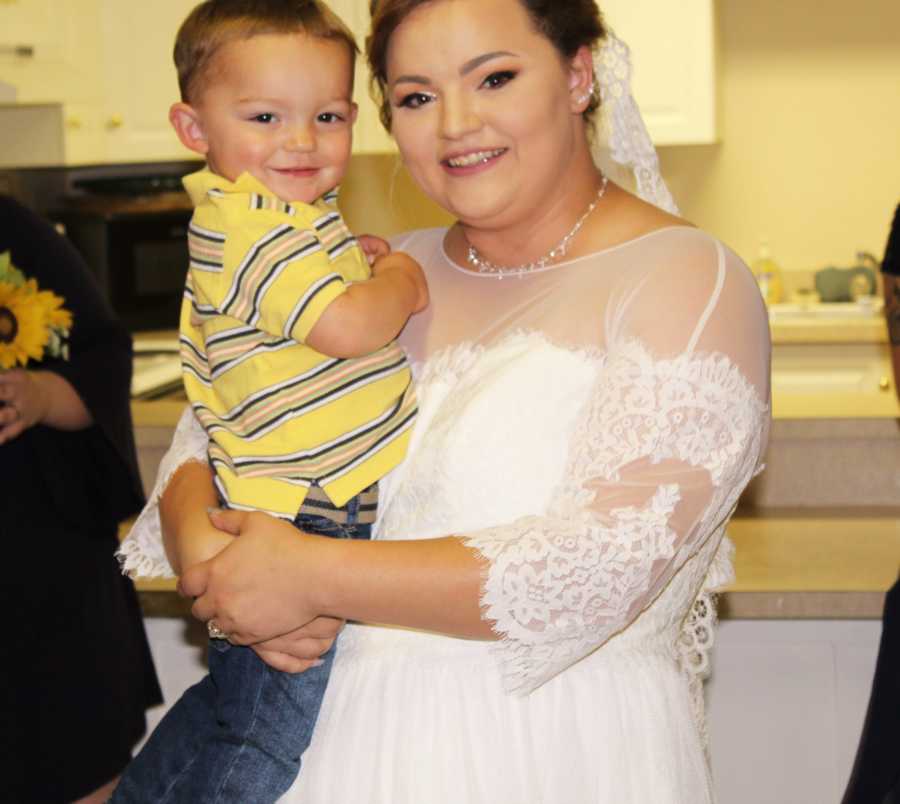 Bride who had struggled with anxiety and depression her whole like holding her newphew