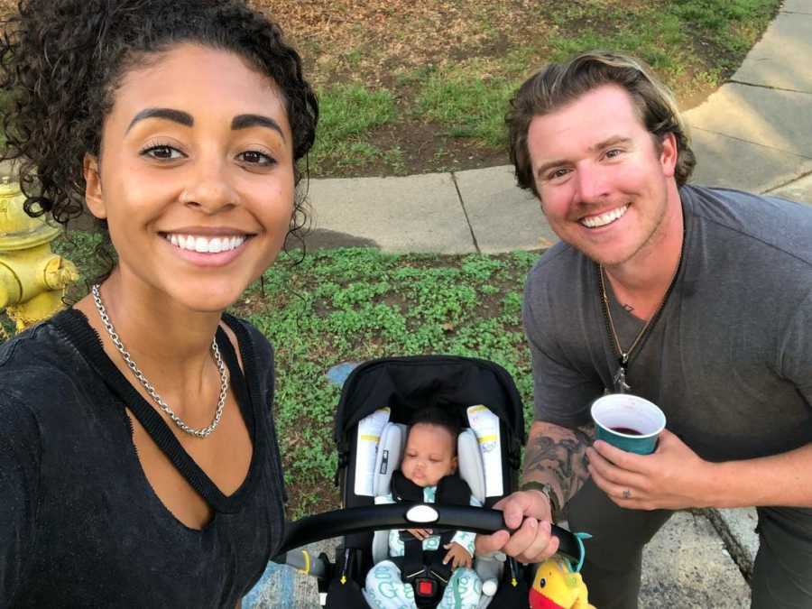 Mother who had multiple miscarriages smiles in selfie with husband and adopted newborn in carseat