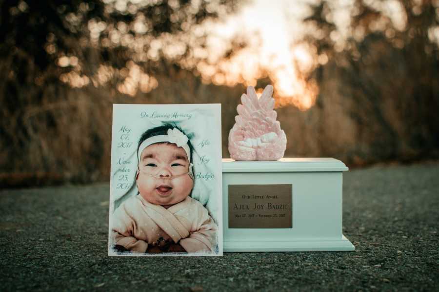 Picture of deceased newborn beside her urn of ashes