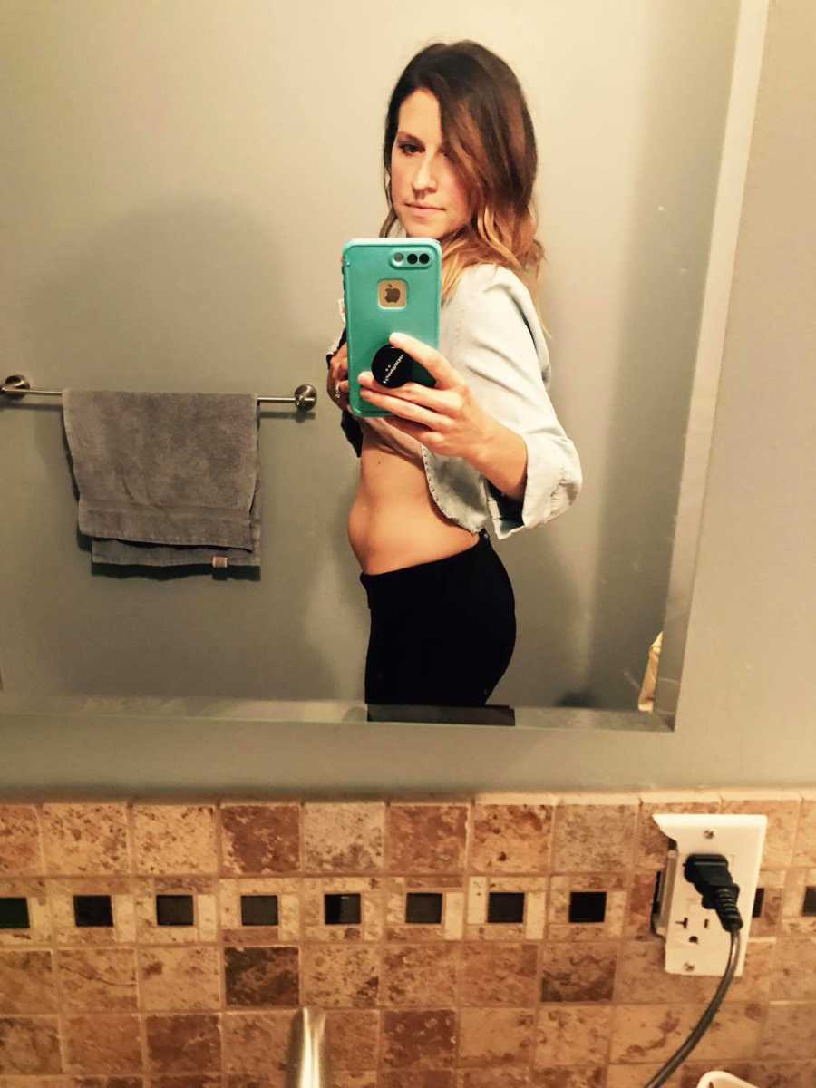 Woman who suffered miscarriage takes mirror selfie in bathroom to show stomach that still looks pregnant