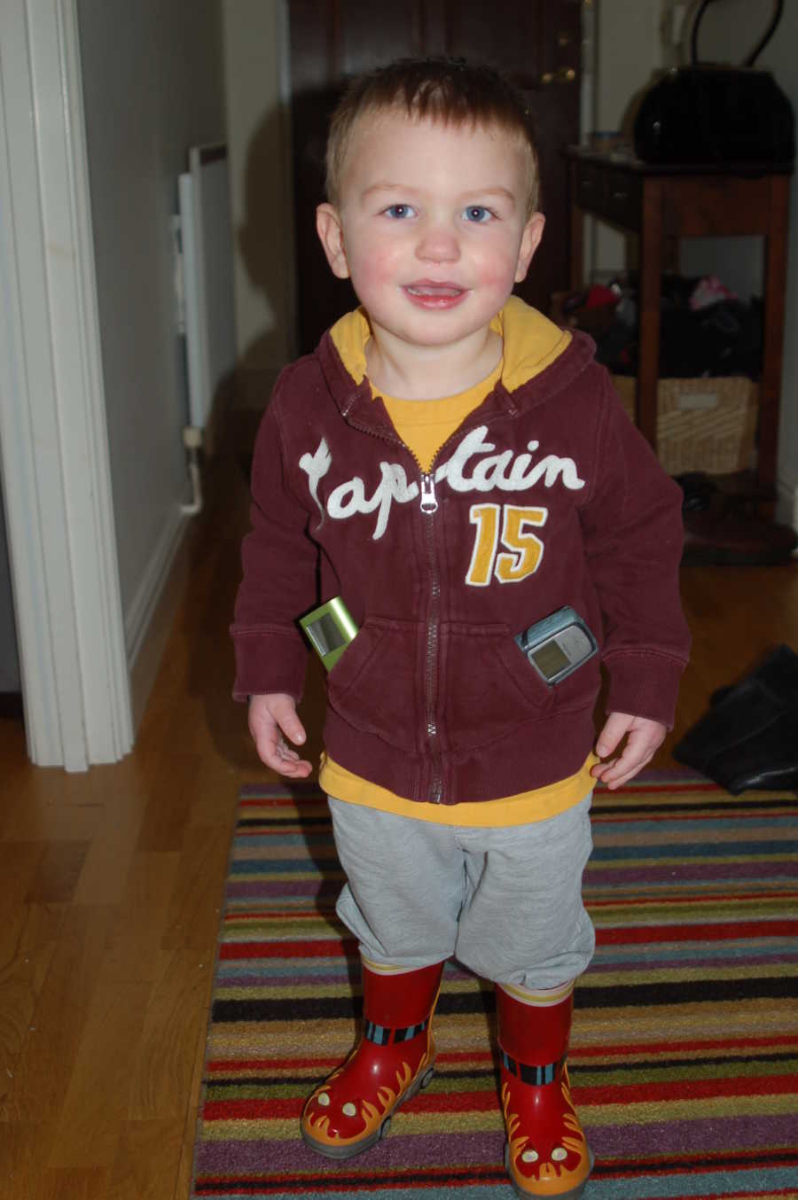 Toddler smiling in his home before being diagnosed with vanishing white matter disease