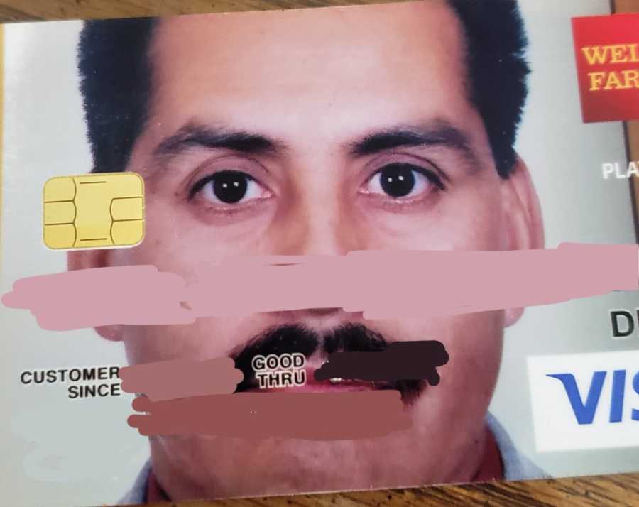 Man's Wells Fargo credit card that has his face covering the entire card