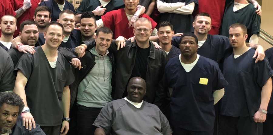 Man who was once a junkie and now an activist stands with men in jail he spoke to