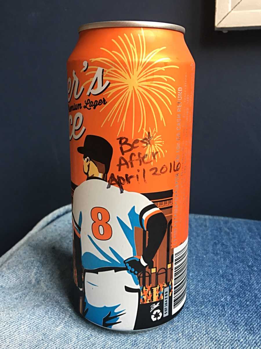 Beer can with words, "Best after April 2016" written on them
