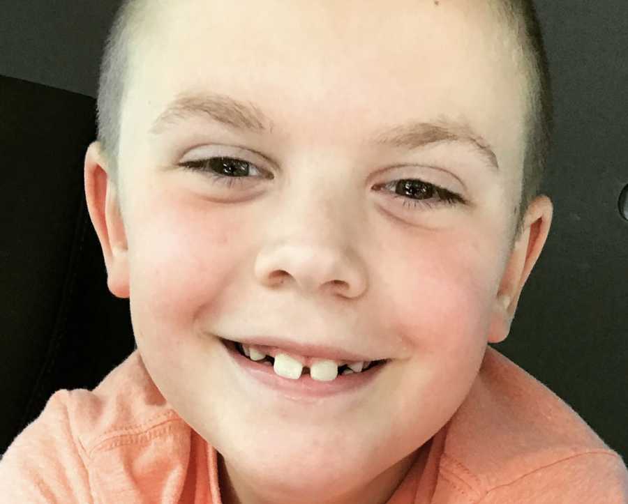 Young boy with autism and speech apraxia smiling