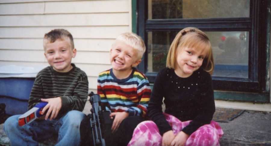 Three siblings that need a foster home as little kids sitting on front porch