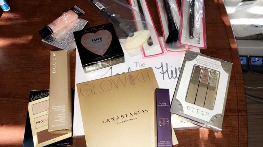 Table full of makeup products for woman who has cystic fibrosis