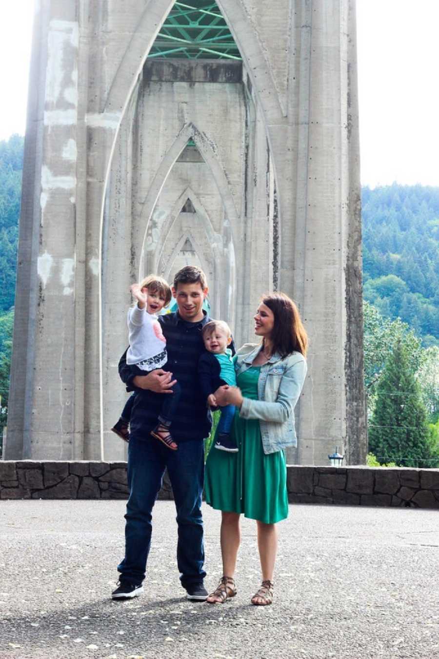 Man who never gets sick but will pass away at young age stands holding daughter beside wife and son