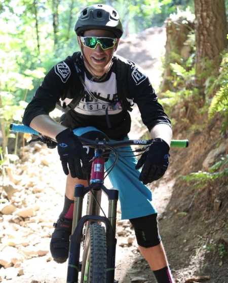 Man on mountain bike who will pass away before his wife gives birth