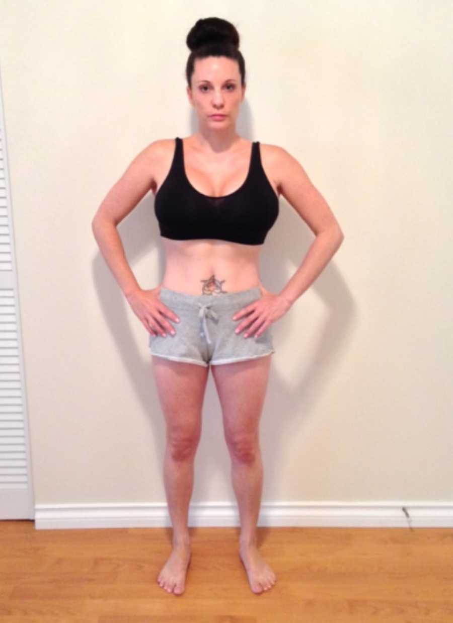 Woman stands in sports bra and shorts with hands on her hips who was diagnosed with POTS Disease