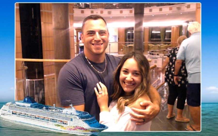 Husband and wife who struggle with fertility stand arm in arm smiling on cruise