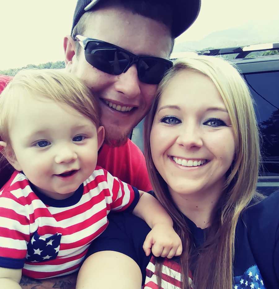 Mother and father who got clean for their sun smile in selfie wearing red white and blue clothes