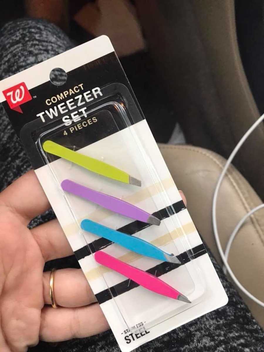 Packaged tweezers that woman bought to pluck hairs from her face