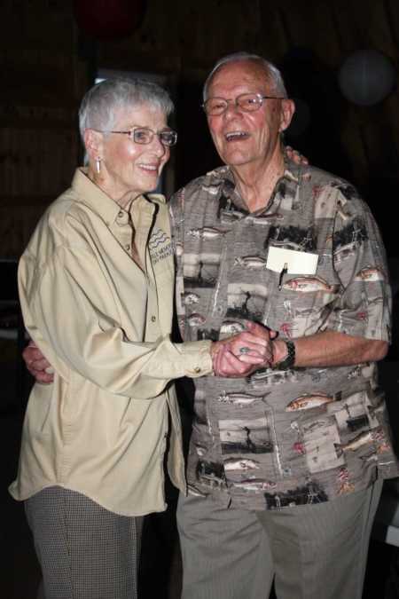Elderly husband and wife dancing before she had dementia