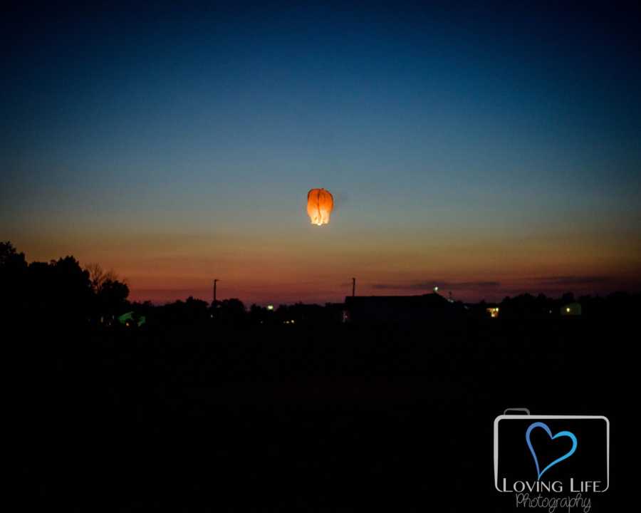 Lantern floating into the sky for late man on his wedding day