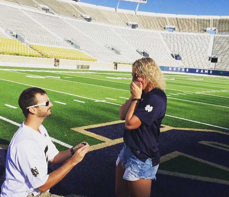 Man proposes to woman on Notre Dame football field