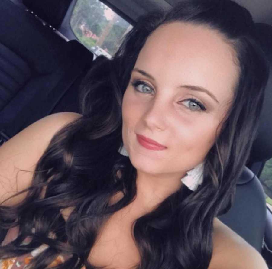 Woman who escaped abusive relationship smiles in selfie in her car