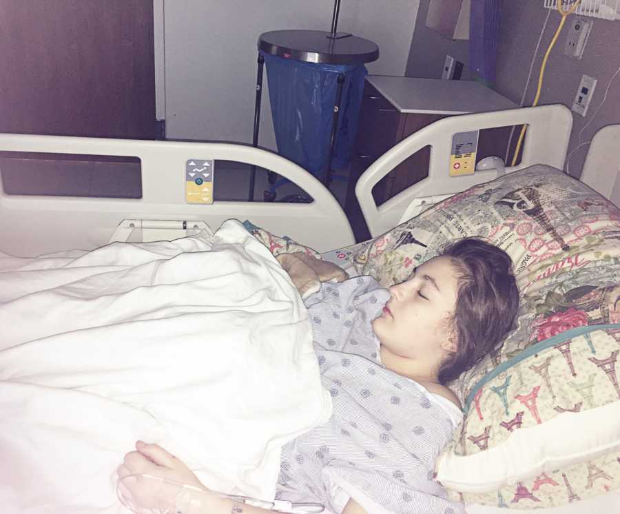 Ten year old with chronic appendicitis asleep in hospital bed