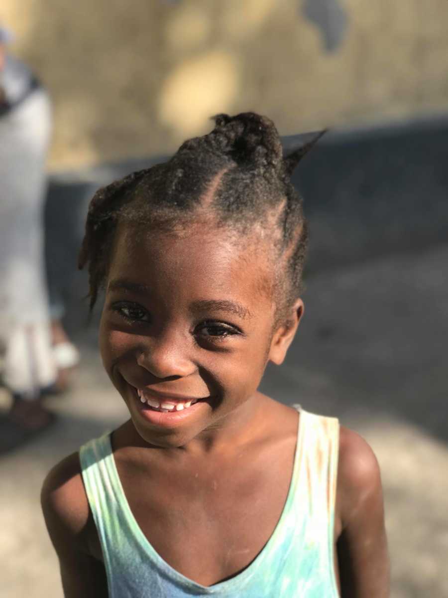 Young Haitian orphan smiling 