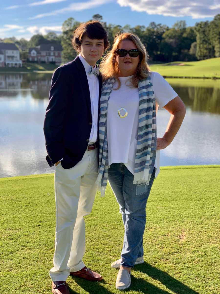 Mother stands on golf course with teen who was beat up in gym class 