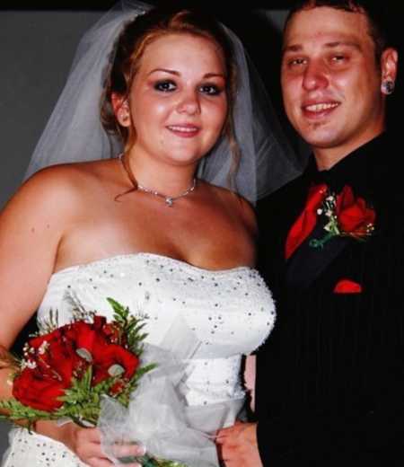 Husband and wife smiling on their wedding day