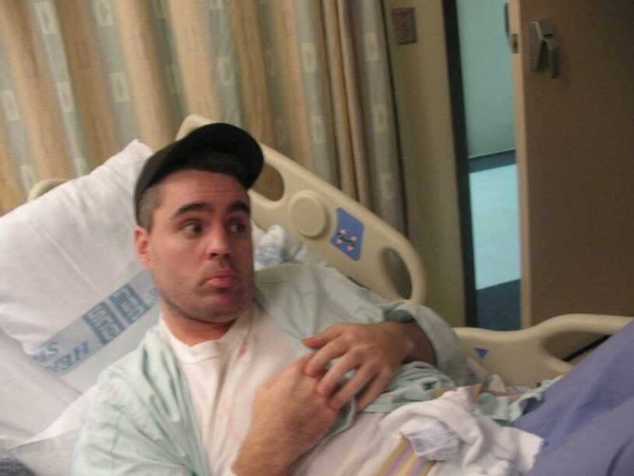 Man lying in hospital bed after brain surgery to remove tumor