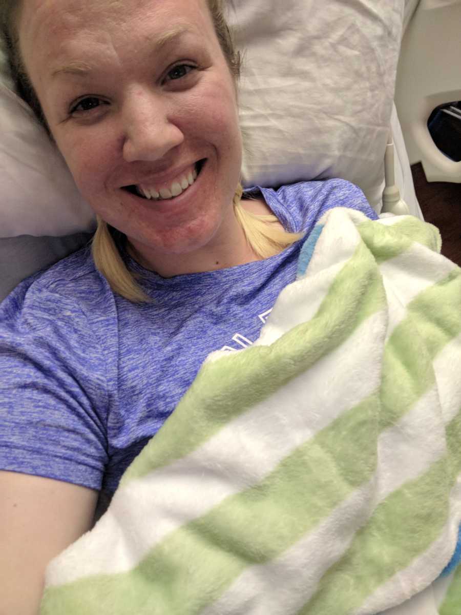 Woman with Sarcoma Cancer smiles in hospital bed