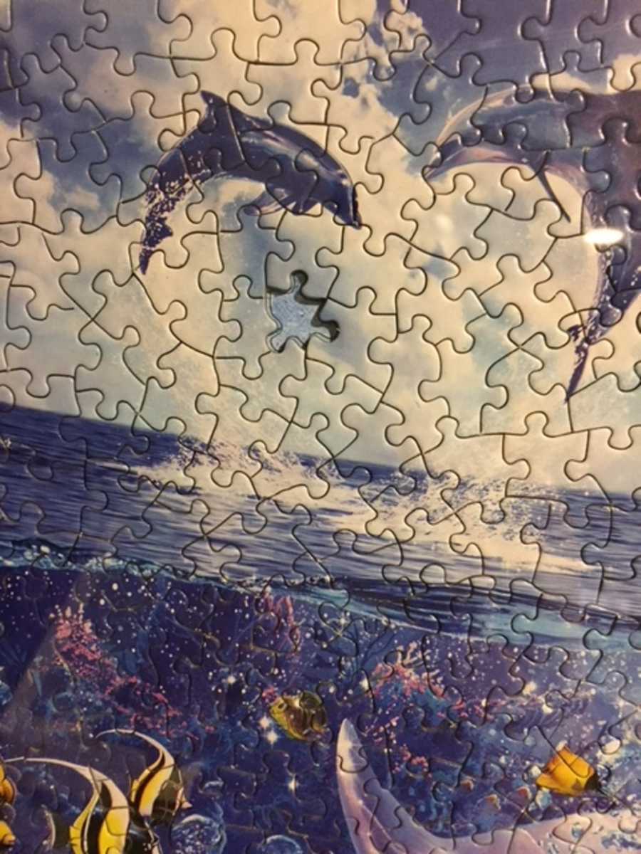 Close up of puzzle with piece missing to show that thing's can still be beautiful with a piece missing