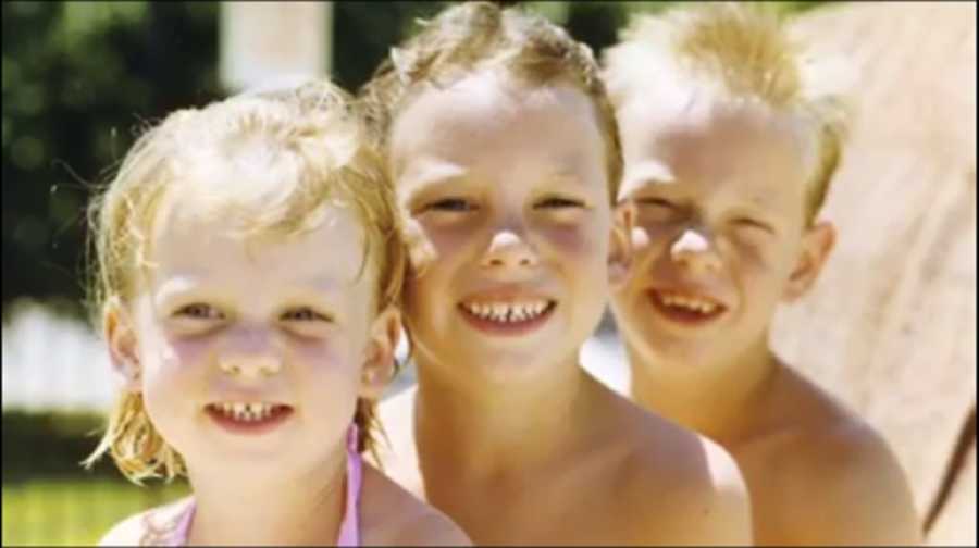 Young boy who will later in life die from smoking a heroin-laced joint sits smiling with brother and sister