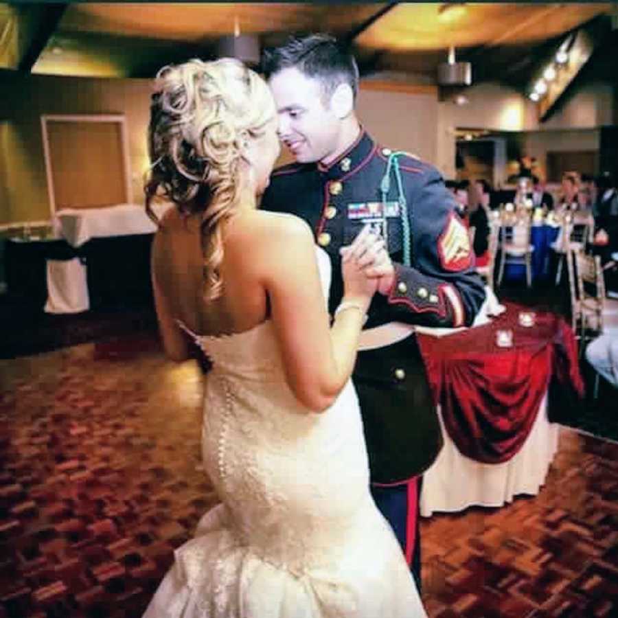 Bride and soldier groom with PTSD dance at wedding reception